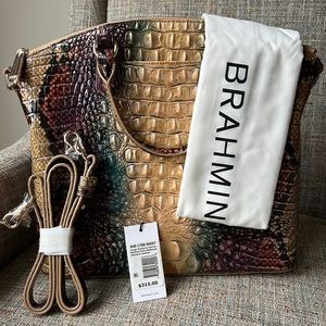 Brand new, large genuine leather bag. This was a gift but not my jam.